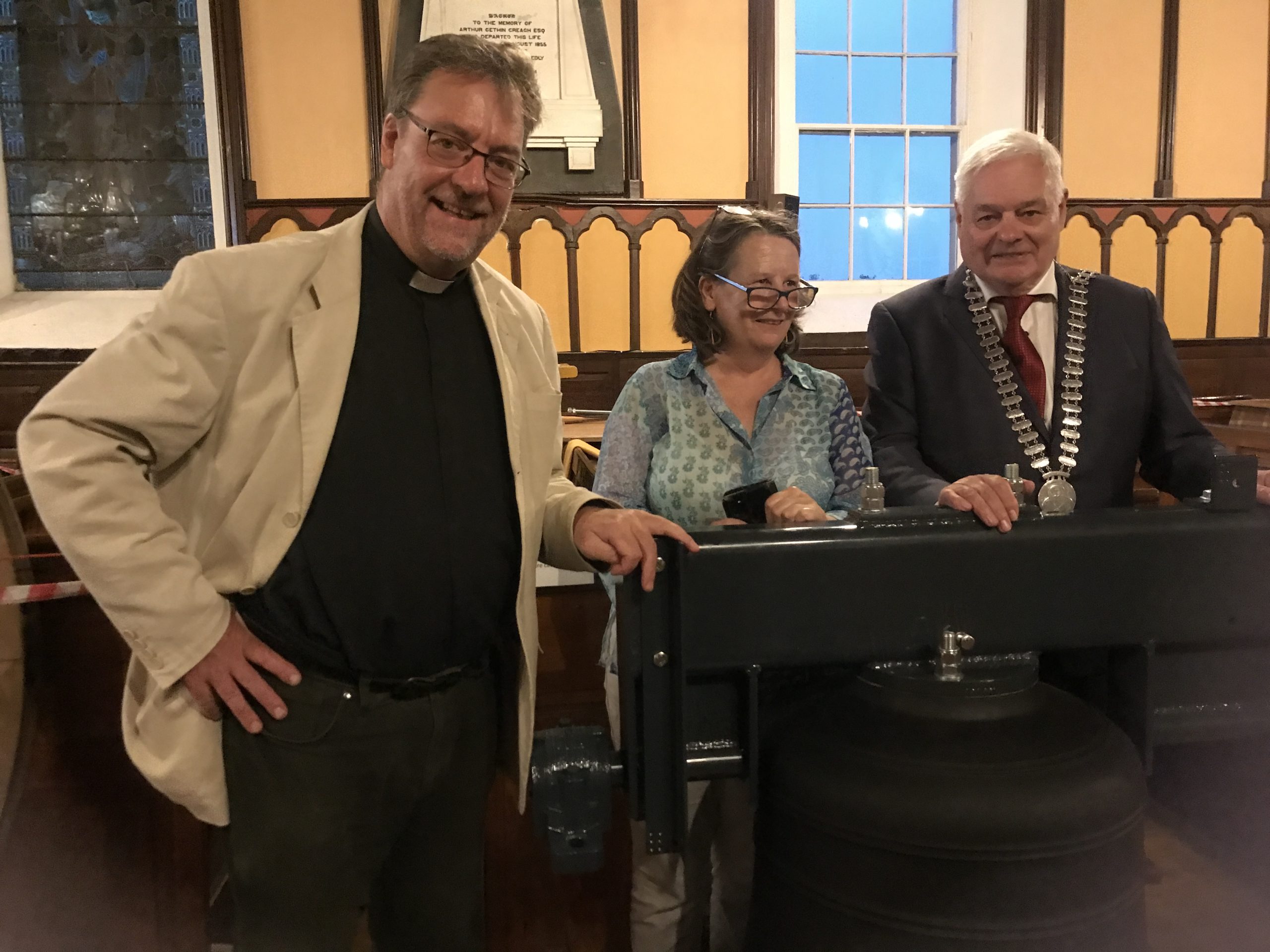The Rector with Mary St Ledger, Rector’s Churchwarden for Doneraile and Cllr. Frank O’Flynn admiring the tenor bell (No. 6) the largest bell in the peal.