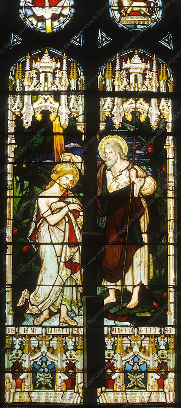 nave; south aisle; south; 3rd from east; Two lancets, 3020mm x 660mm and nine tracery-lights. PATRONAGE In memory of Ada, wife of James J. Dudley. STUDIO Watson & Co., Youghal (sgn) DATE 1907 (mem) ICONOGRAPHY Baptism of Christ